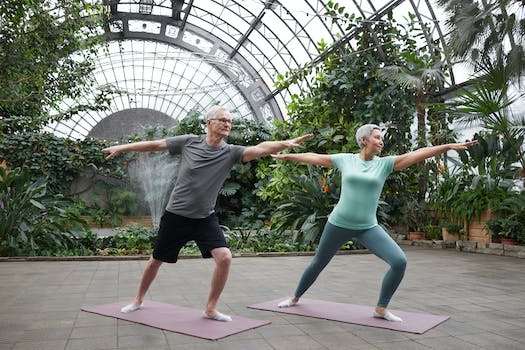 Mature couple exercising to keep fit